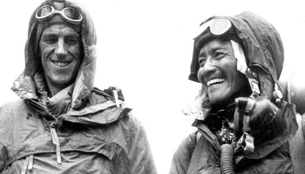 Sir Hillary and Norgay smile at the British Embassy in Kathmandu, after their conquest of Mt. Everest