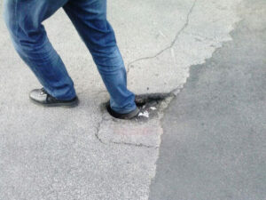 buche stradali e cadute